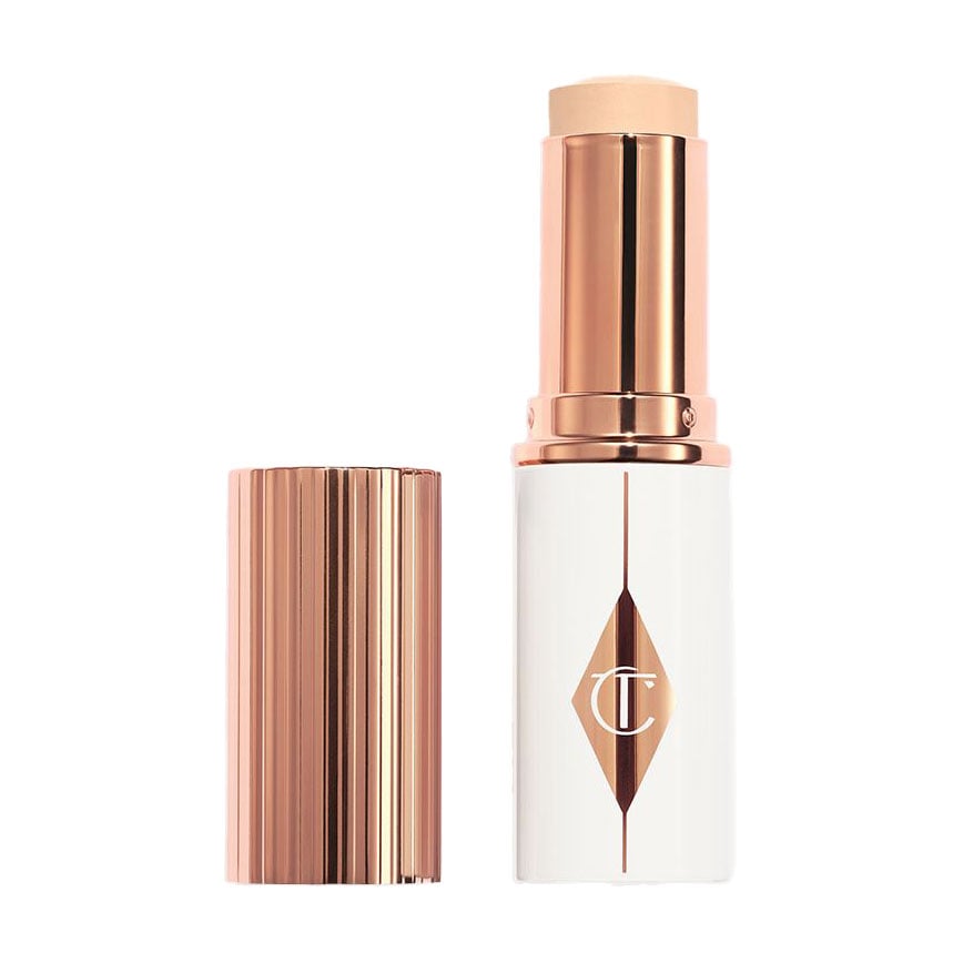 Тональна основа-стік для обличчя Charlotte Tilbury Unreal Skin Sheer Glow Tint 1.5 Fair, 8 г